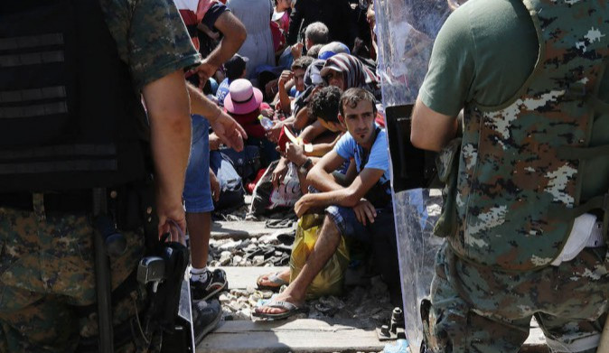 Migranti, policie. Ilustrační foto