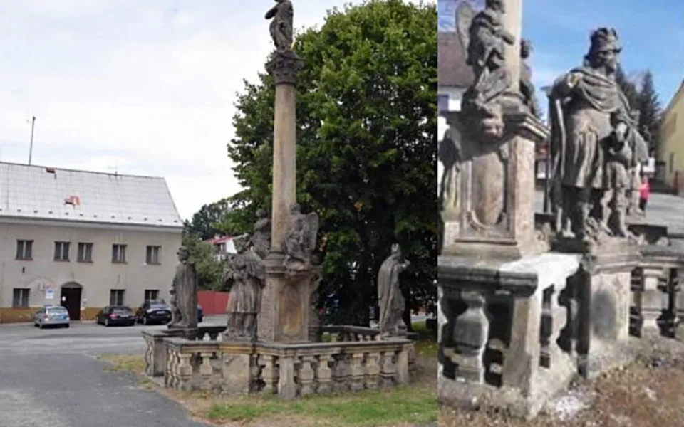 Poškozená socha.